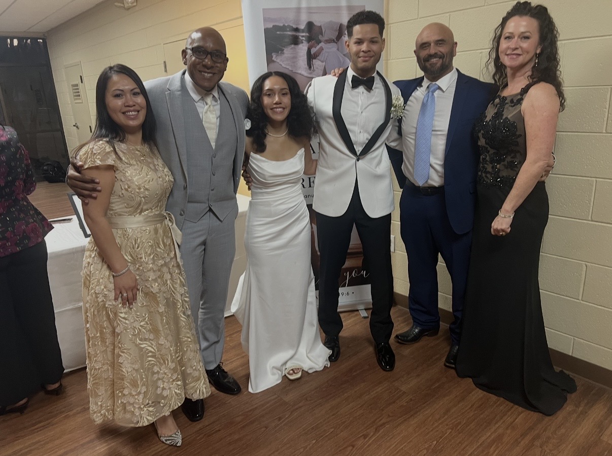 Dr. King and V. King celebrating the wedding of Faith and Treyson with Pastor Scott and Marcy