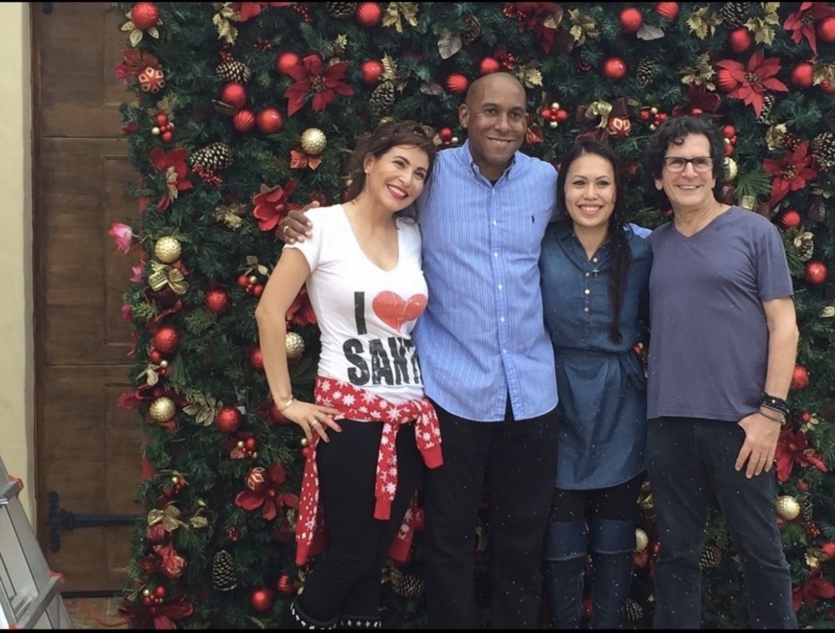 Dr. King and V. King celebrating Christmas with friends Mark and Josie Nejame