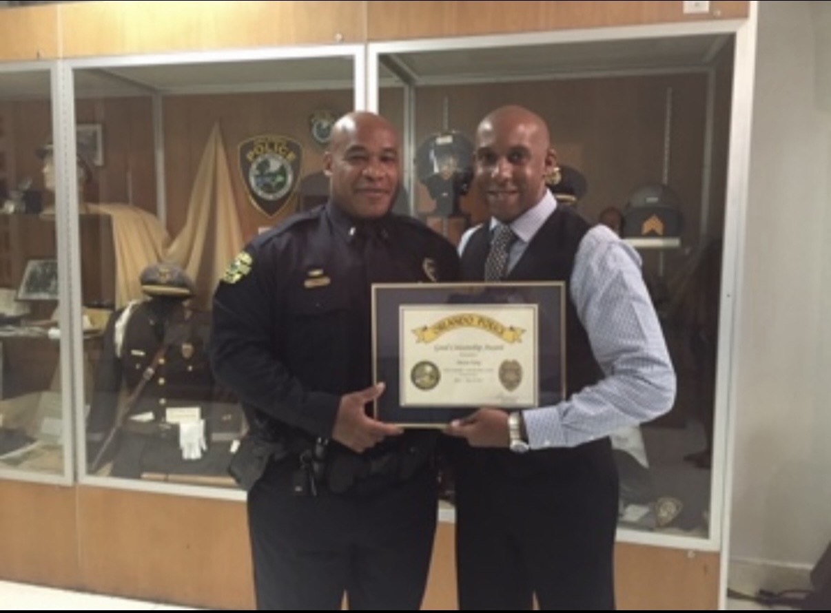 Dr. Dexter King receiving the Orlando Police Chief's Citizenship Award